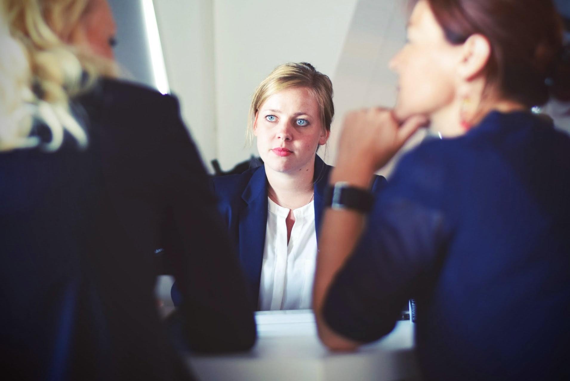 young woman in process with recruiters